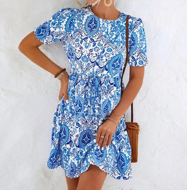 Alicia Printed Short Sleeve Dress In Blue Ruffled Mini Skirt